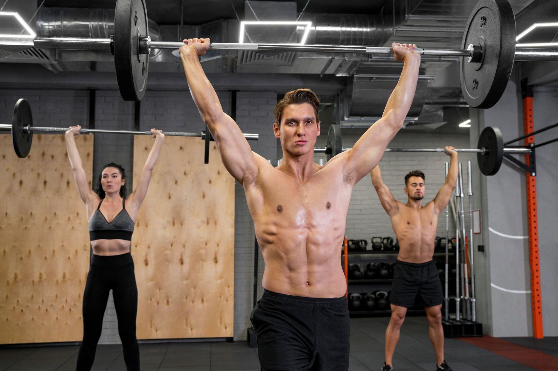 Standing Overhead Press. (Image via Freepik)